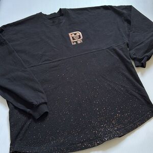 Disney Black sweatshirt with gold/bronze Logo & specs.  Adult size large